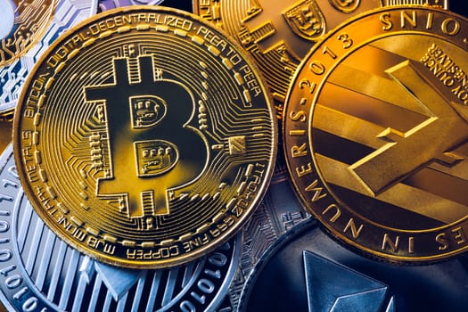 Set of cryptocurrencies with Bitcoin, Etherium, Ripple, Litecoin. Cryptocurrencys new digital money. Bitcoin on the front as the leader. Bitcoin as most important cryptocurrency.