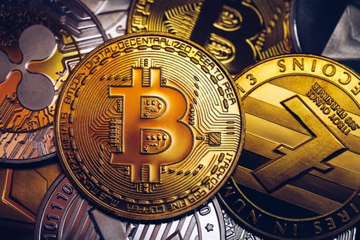 Set of cryptocurrencies with Bitcoin, Etherium, Ripple, Litecoin. Cryptocurrencys new digital money. Bitcoin on the front as the leader. Bitcoin as most important cryptocurrency.
