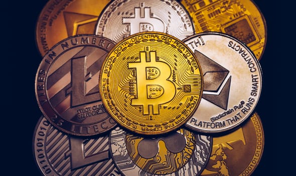 Set of cryptocurrencies with Bitcoin, Etherium, Ripple, Litecoin. Cryptocurrencys new digital money. Bitcoin on the front as the leader. Bitcoin as most important cryptocurrency.