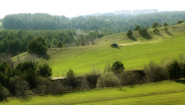 Beautiful summer landscape with green hills and blue sky.