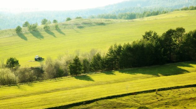 Beautiful summer landscape with green hills and blue sky.