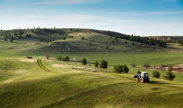 Beautiful summer landscape with green hills and blue sky.