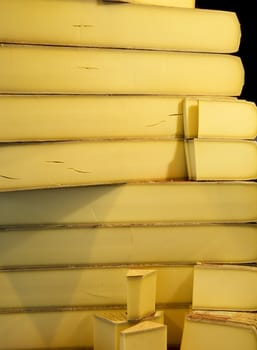 A pile of cut cheese on a market stall