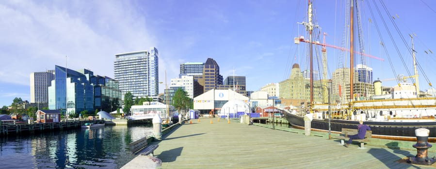 Halifax, Canada - September 23, 2018: Panoramic view of the harbor and the downtown, with locals and visitors, in Halifax, Nova Scotia, Canada