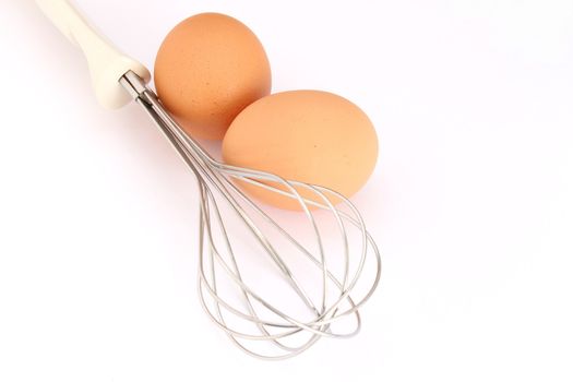 Fresh eggs and whisk