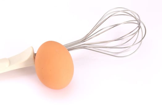 Fresh egg and whisk