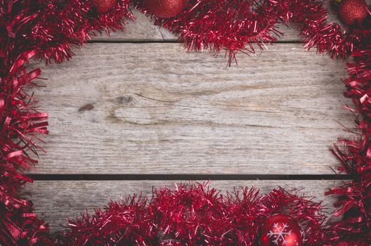 merry christmas concept with red decoration on old wooden board