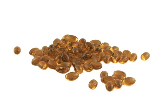 omega 3 pills heap isolated on a white background.pile of fish oil gel capsules. Cod liver oil  Supplement in soft gel form 
