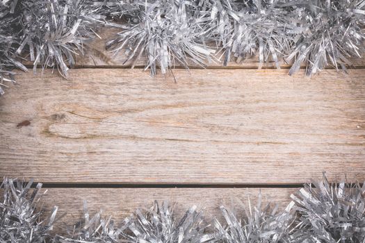 merry christmas concept with grey decoration on old wooden board