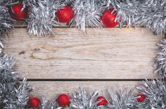 merry christmas concept with grey decoration on old wooden board