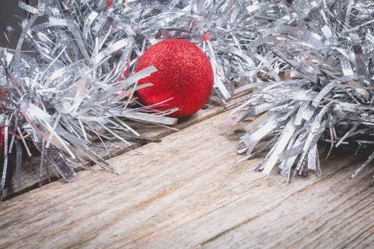 merry christmas concept with grey decoration on old wooden board