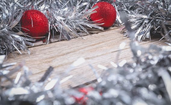 merry christmas concept with grey decoration on old wooden board