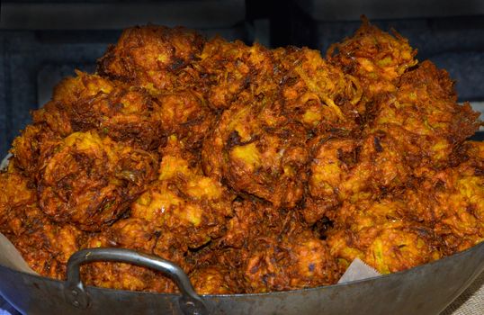 Onion Bhajis in a wok