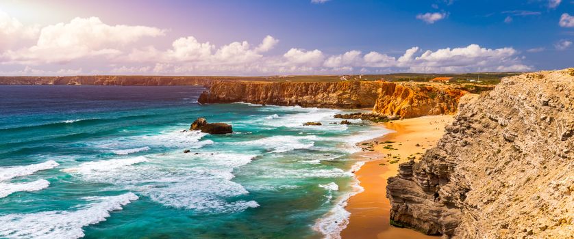 Panorama view of Praia do Tonel (Tonel beach) in Cape Sagres, Algarve, Portugal. Praia Do Tonel, beach located in Alentejo, Portugal. Ocean waves on Praia Do Tonel beach. View from Sagres fortress.