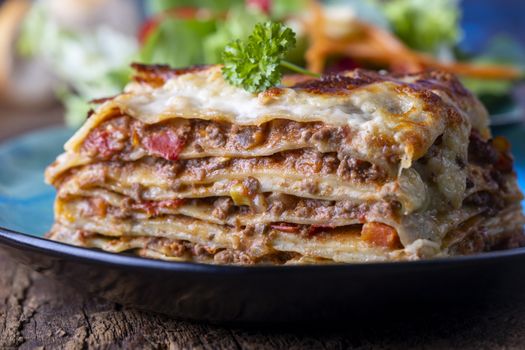 portion of fresh lasagna on a plate