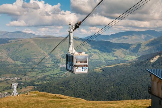 Saint Lary Soulan, France - August 20, 2018: cable car that connects directly the city center of Saint Lary to the station in winter for skiing and in summer for the downhill bike