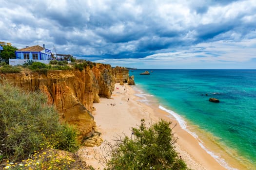 Praia dos Tres Castelos in south Portugal, Portimao, Algarve region. Landscape with Atlantic Ocean, shore and rocks in Tres Castelos beach (Praia dos Tres Castelos), Algarve, Portimao, Portugal.