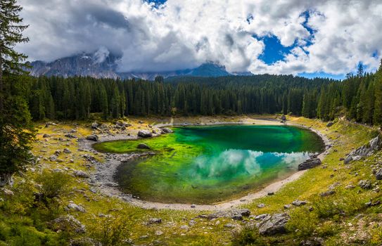 Karersee (Lago di Carezza), is a lake in the Dolomites in South Tyrol, Italy.