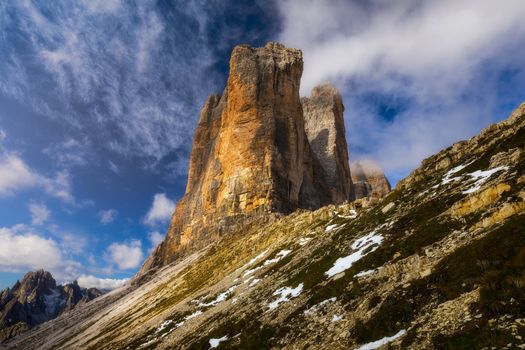 View of the National Park Tre Cime di Lavaredo, Dolomites, South Tyrol. Location Auronzo, Italy, Europe. Dramatic cloudy sky. Beauty world.