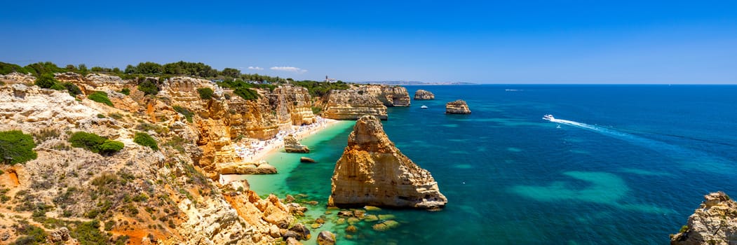 Praia da Marinha, beautiful beach Marinha in Algarve, Portugal. Navy Beach (Praia da Marinha), one of the most famous beaches of Portugal, located on the Atlantic coast in Lagoa Municipality, Algarve.