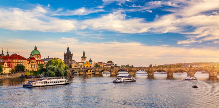 Scenic view on Vltava river and historical center of Prague, buildings and landmarks of old town, Prague, Czech Republic. Charles Bridge (Karluv Most) and Lesser Town Tower, Prague, Czechia