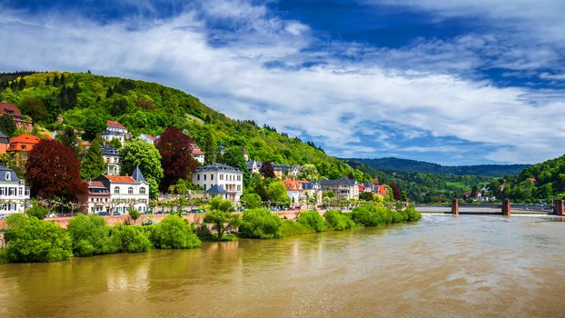 Panoramic view of beautiful medieval town Heidelberg including Carl Theodor Old Bridge, Neckar river, Church of the Holy Spirit, Germany