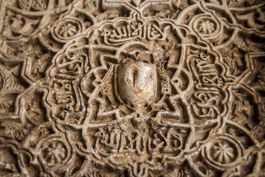 Arabic decoration in plaster. Alhambra of Granada. Spain