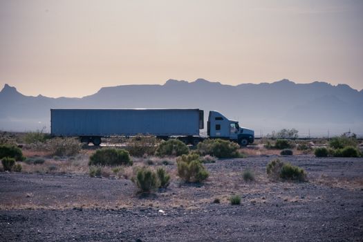 Delivery truck moving on Interstate 40 in California, USA.