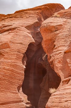 Lower Antelope canyon entrance, crack in the red rock, Arizona nature. Arizona, USA.