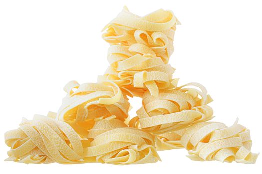 pasta pappardelle nest tower close up on a isolated white background