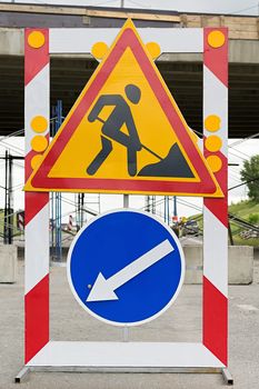 Closeup of road sign, detour, road repair on asphalt road on highway