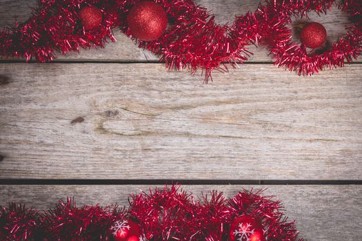 merry christmas concept with red decoration on old wooden board