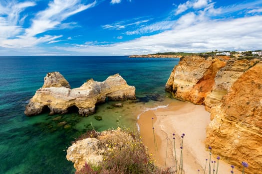 Careanos Beach (Praia dos Careanos) in Portimao, Algarve, Portugal. Concept for travel in Portugal and summer vacations in Portimao, Algarve, Portugal. 
