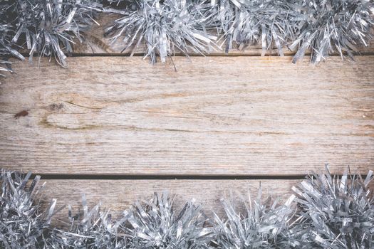 merry christmas concept with grey decoration on old wooden board