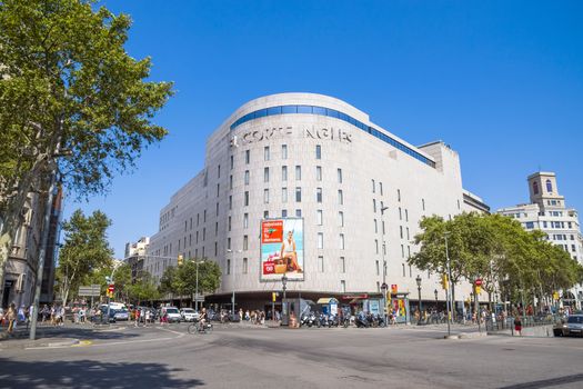 BARCELONA, SPAIN - JULY 5, 2016: Facade of the mall "El Corte Ingles" in the Placa de Catalunya. It is one of the largest shopping centers in Europe.

Barcelona, Spain - July 5, 2016: Facade of the mall "El Corte Ingles" in the Placa de Catalunya. It is one of the largest shopping centers in Europe. People are walking by street.