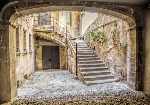 Ancient medieval narrow street in Girona. Spain. Catalonia.