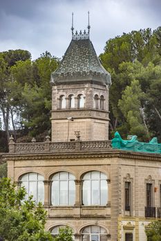 BARCELONA, SPAIN - JULY 3, 2016: Gaudi House Museum in Park Guell in Barcelona. It is a home where Antoni Gaudi, Spanish artist, lived and worked. 

Barcelona, Spain - July 3, 2016: Gaudi House Museum in Park Guell in Barcelona. It is a home where Antoni Gaudi, Spanish artist, lived and worked.