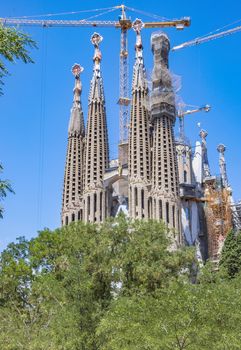 BARCELONA, SPAIN - JULY 5, 2016: La Sagrada Familia - the impressive cathedral designed by Gaudi, which is being build since 19 March 1882 and is not finished yet.

Barcelona, Spain - July 5, 2016: La Sagrada Familia - the impressive cathedral designed by Gaudi, which is being build since 19 March 1882 and is not finished yet.