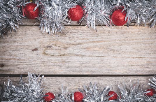 merry christmas concept with grey decoration on old wooden board