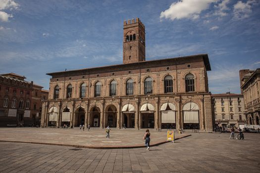 BOLOGNA, ITALY 17 JUNE 2020: Palazzo del Podesta in Bologna, Italy a famous building in Piazza Maggiore the most important square in the city under a blue sky