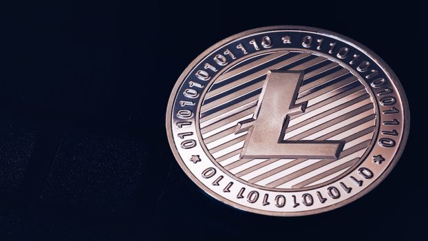 Litecoin cryptocurrency (crypto currency). Silver Litecoin coin with gold Litecoin symbol. Litecoin (ltc) cryptocurrency.