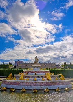 Versailles, France - April 24, 2019: Fountain of Latona in the garden of Versailles Palace on a sunny day outside of Paris, France.