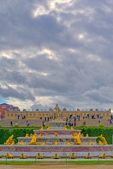 Versailles, France - April 24, 2019: Fountain of Latona in the garden of Versailles Palace on a sunny day outside of Paris, France.