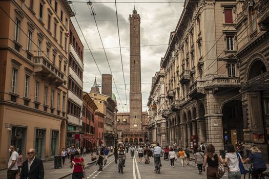 BOLOGNA, ITALY 17 JUNE 2020: Via Rizzoli in Bologna, Italy with his historical Building and the Asinelli Tower at the end