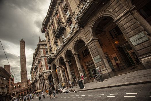 BOLOGNA, ITALY 17 JUNE 2020: Via Rizzoli in Bologna, Italy with his historical Building and the Asinelli Tower at the end