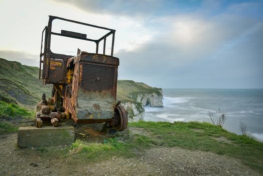 Yorkshire, UK - March 2020: Rusting  tractor engine once used to launch life boats at RNLI Flamborough Lifeboat Station