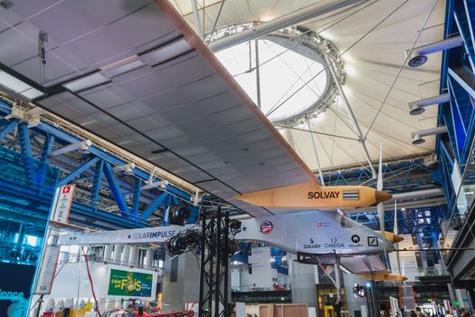 Paris, France - October 6, 2018: Exhibition of the famous Solar Impulse HB-SIA electric aircraft during the Science Fair 2018 in the hall of the City of Science and Industry