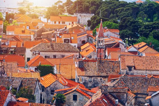 Trogir in Croatia, town panoramic view with red roof tiles, Croatian tourist destination. Trogir town sea front view, Croatia. Roofs of Trogir in Croatia.