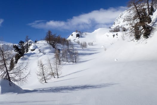 Casaccia, Switzerland: winter landscape, Lareccio canals and Colombe pass