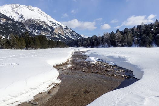 Casaccia, Switzerland: winter landscape, Lareccio canals and Colombe pass